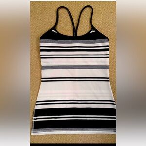 Lululemon Women's tan white and black  tank top with shelf bra. EUC POMS